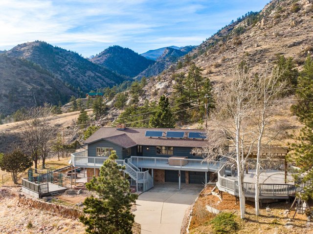 Property Photo 50 4,044 sq ft custom home, 644 sq ft attached garage, 2,160 sq ft detached shop/RV building. This home is renovated and has upgrades galore!