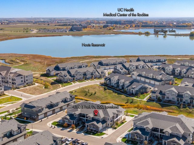 Property Photo 4 Move-in Ready, An exceptionally sunny corner end-residence, townhome-style condo in the The Lakes at Centerra, ideally positioned moments from I-25 + Highway 34 w/ easy access to Centerra's premier amenities, just off I-25 & Hwy 34! 1,653 finished SQFT!
