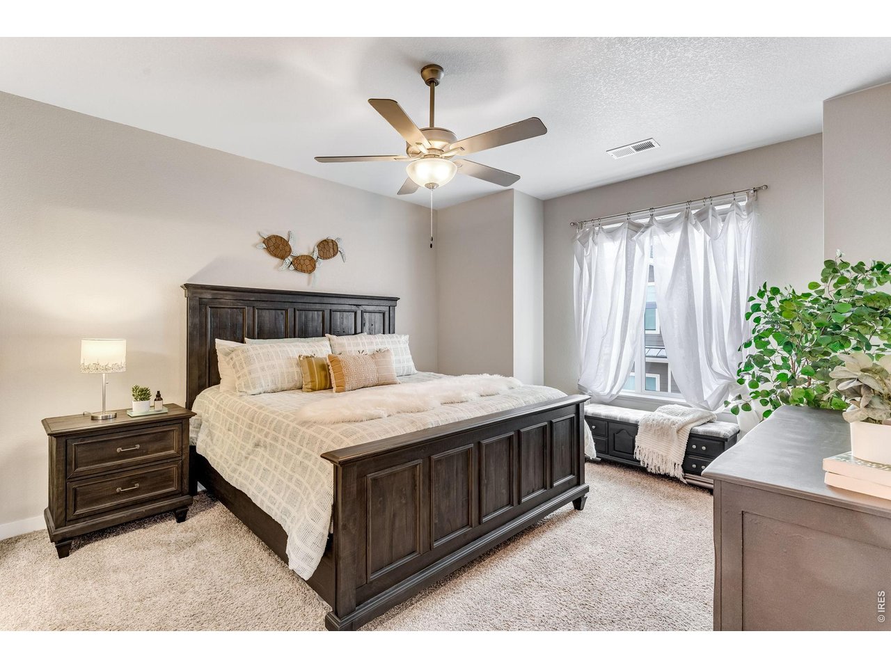 Spacious Primary Suite, with ceiling fans and central air, plush comfortable carpet and thick pad
