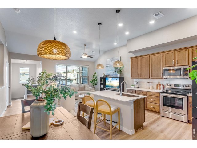 Property Photo 1 Adorable Raised Ranch lightly lived-in & inviting open-concept layout. 1,653 finished SQFT with 1,535 SQFT on one level living, thoughtfully designed with 3 Bedrooms + versatile Office Nook area, 2 Bathrooms balancing comfort, function and style.