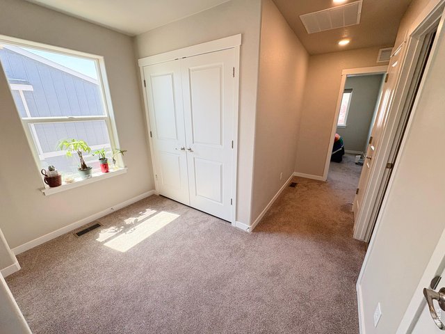 Property Photo 16 Hallway upstairs.