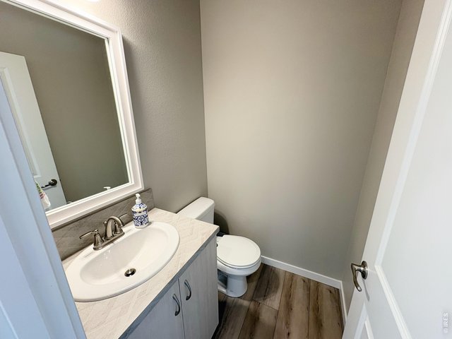 Property Photo 8 Main floor 1/2 bathroom.