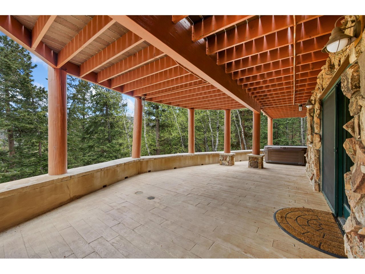 Big Stamped-Concrete Patio Under the Deck