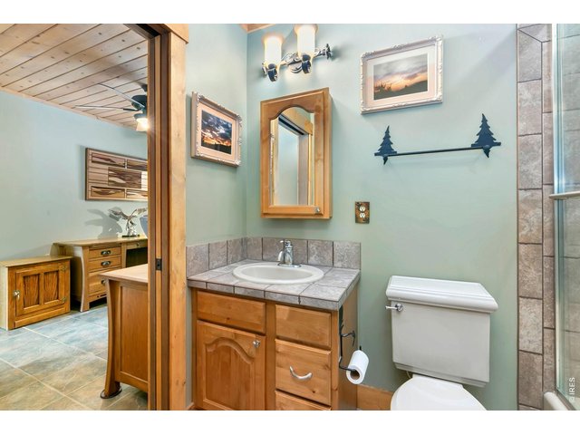 Property Photo 26 Main-floor guest bath next to office