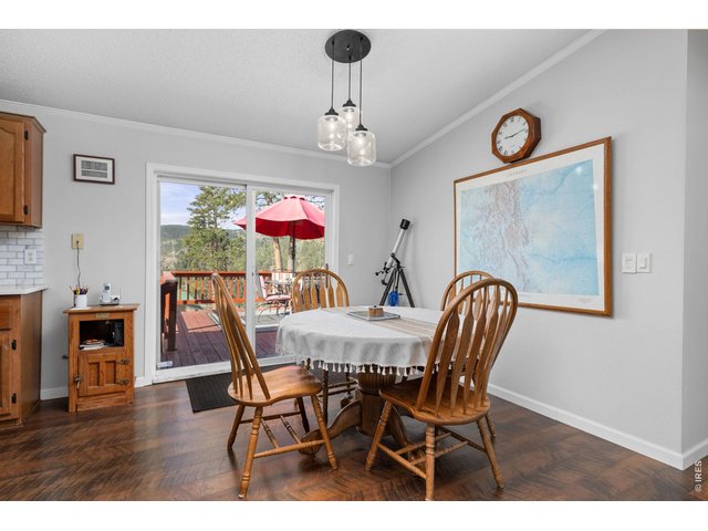 Property Photo 11 Dining with slider to the back deck. 