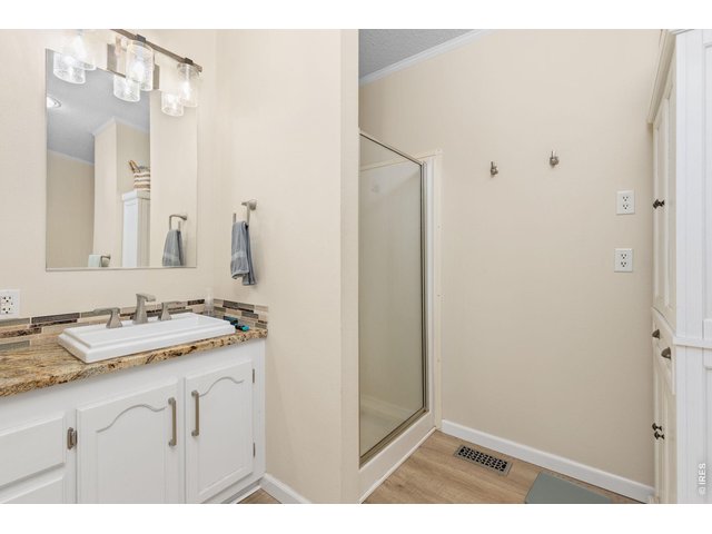 Property Photo 14 Primary bathroom - 4 piece.