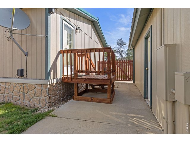 Property Photo 23 Breezeway between the main home and detached garage.