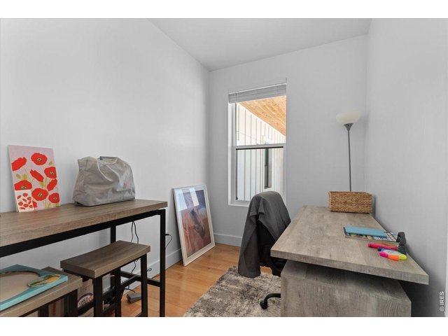 Property Photo 20 Corner office with hardwood flooring