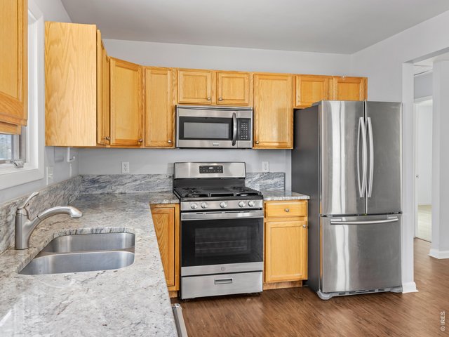 Property Photo 6 Granite Countertops and Stainless Steel Apliances