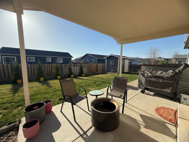 Property Photo 22 Exterior Backyard Covered Patio