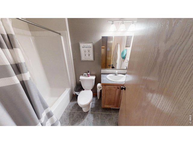 Property Photo 12 Main Level Primary Bath