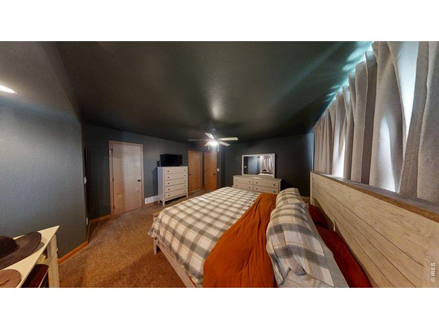 Property Photo 11 Primary Bedroom View 2