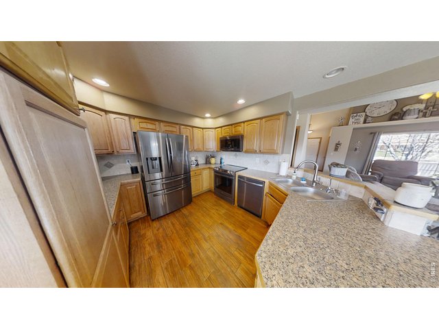 Property Photo 8 Kitchen View 1