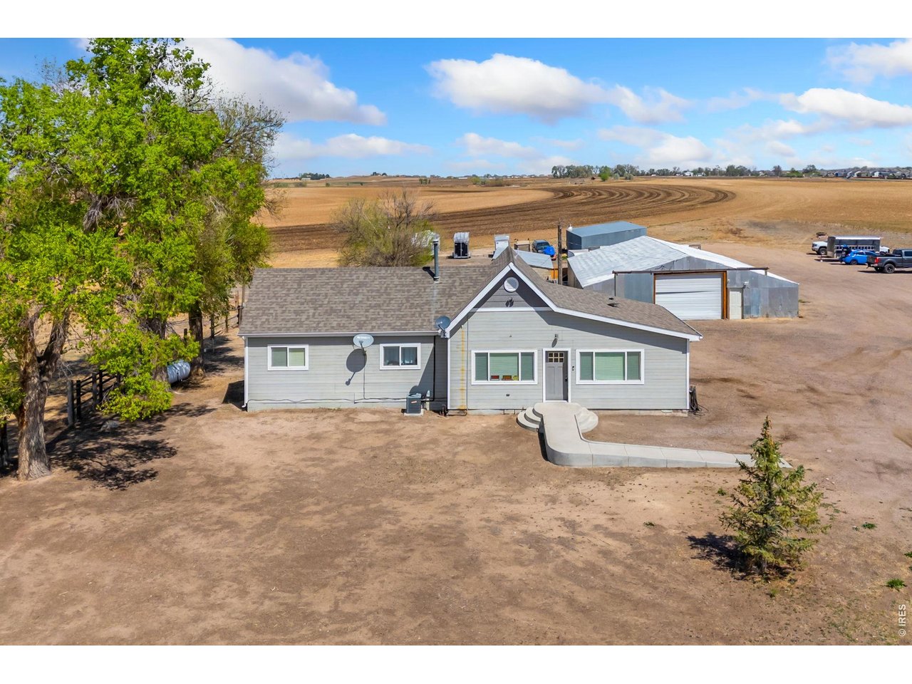 Located just minutes from Downtown Windsor, this fully updated farmhouse on 3.94 acres offers a rare combination of functionality, location, and endless potential. The 1,258 sq. ft. home features 3 bedrooms and 2 bathrooms and has been thoughtfully updated
