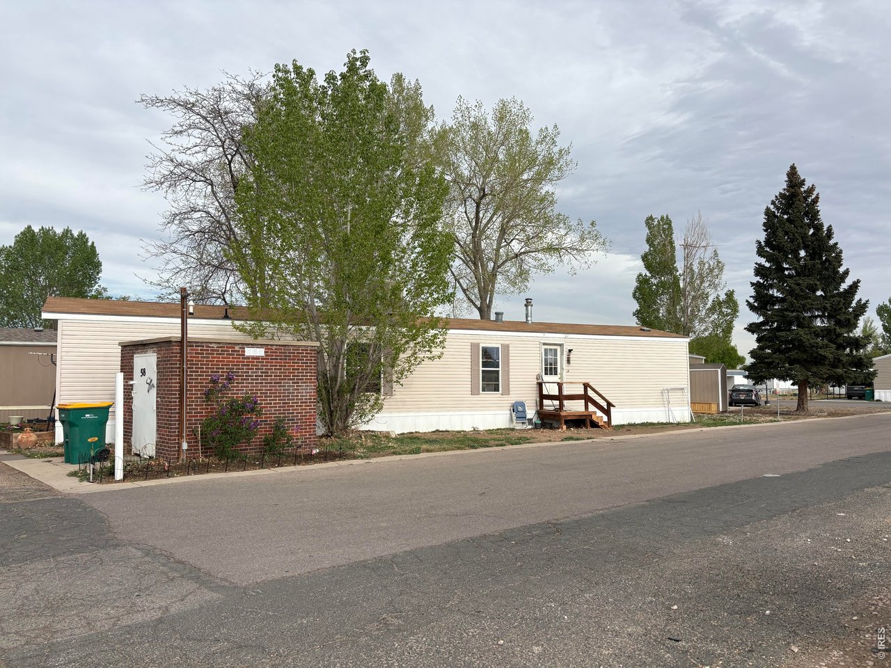 Corner lot with storage building number 2, New tankless water heater, new furnace, oversized AC unit, fresh paint, Newer roof and skirting