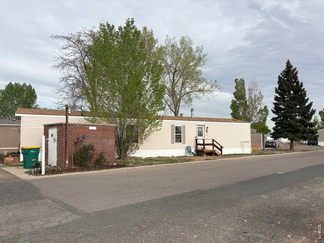 Property Photo 3 Corner lot with storage building number 2, New tankless water heater, new furnace, oversized AC unit, fresh paint, Newer roof and skirting