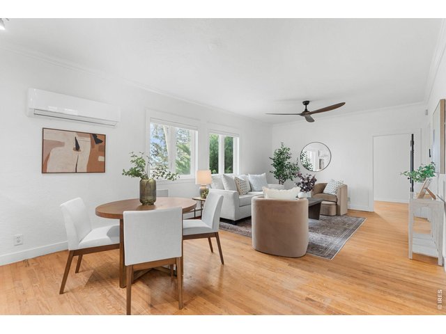Property Photo 14 Open floor plan with beautiful hardwood floors