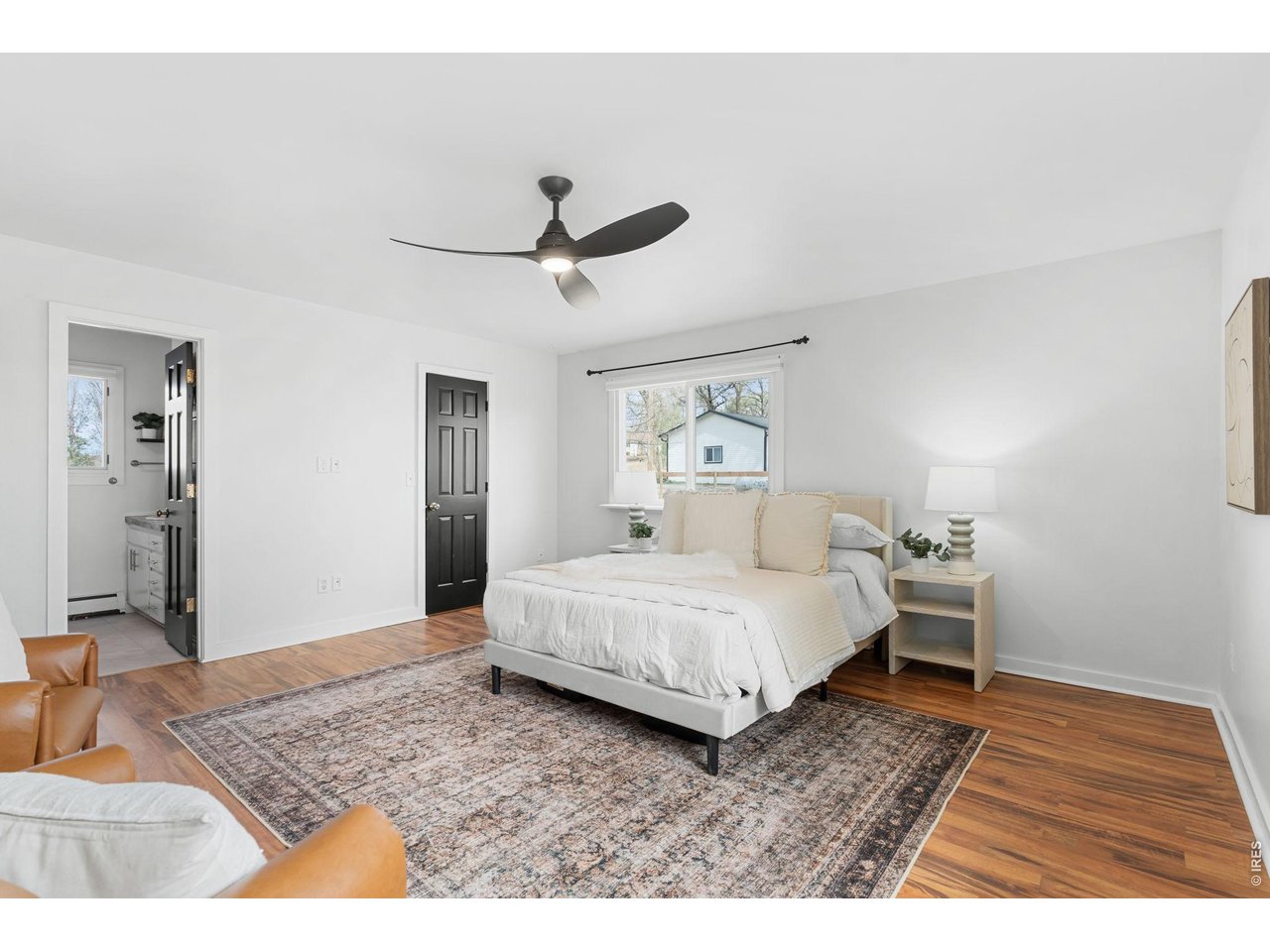 Primary bedroom features an ensuite bathroom & walk-in closet