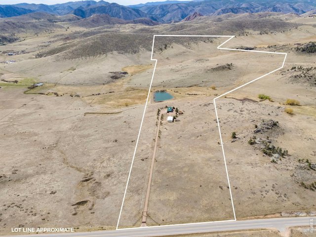 Property Photo 5 The property is 145.83 acres and is accessed by a long private and gated driveway. Boundary Overlay is For Reference Only. 