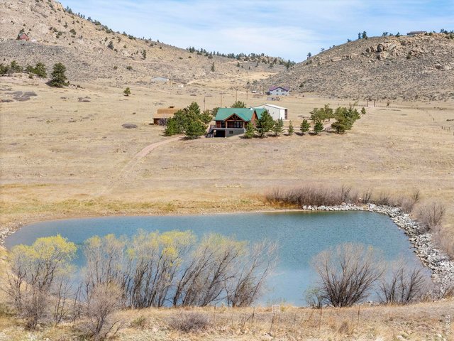Property Photo 6 Featuring a stocked trout pond!