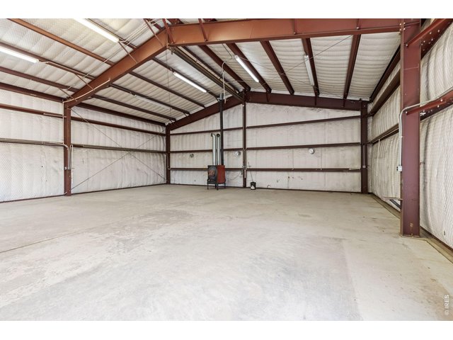 Property Photo 37 Interior of the 40'x40' outbuilding. 