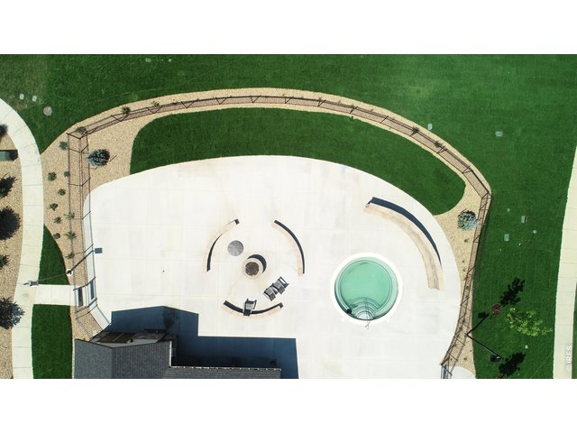 Property Photo 47 Aerial view of hot tub, firepit and outdoor space at clubhouse.