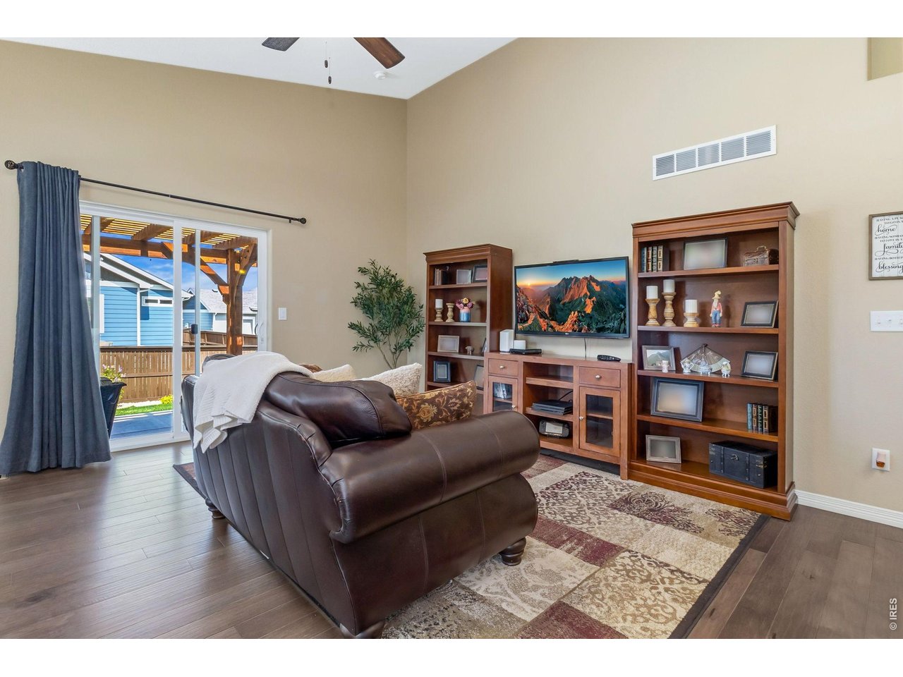 Nice living room with patio access. This space is perfect for relaxation and entertaining, offering a comfortable and inviting atmosphere.