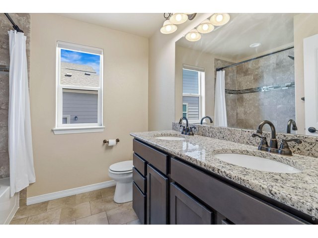 Property Photo 22 Full Bathroom on Main level between 2nd & 3rd Bedrooms