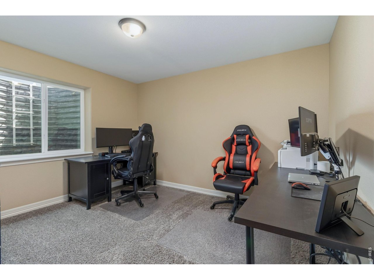 5th Bedroom in the Basement which has a large walk-in closet This room provides an ideal setting for focused work and productivity.