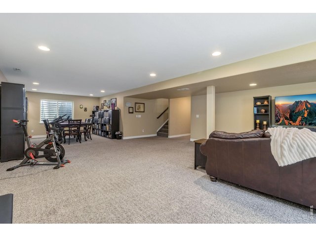 Property Photo 33 Plenty of space in this finished basement. This area offers great potential for a home theater, a playroom, and workout area.
