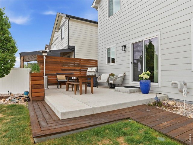 Property Photo 7 Teak Privacy Wall and Planter Box Creates the Perfect Outdoor Space 