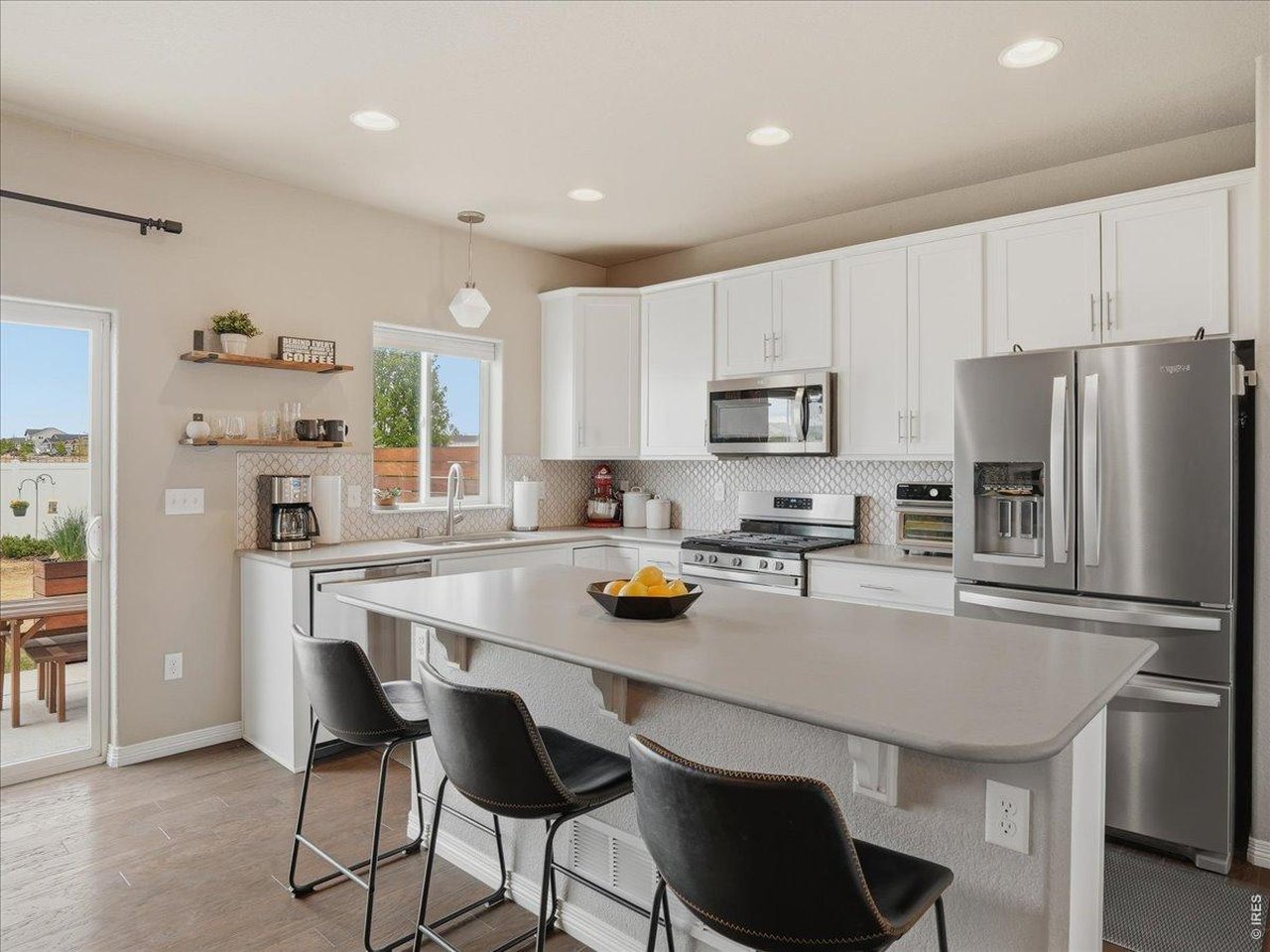 Beautiful White Kitchen With Upgraded Tile Backsplash