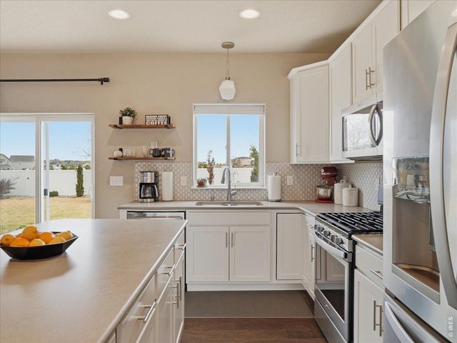 Property Photo 5 Natural Light Fills The Kitchen 