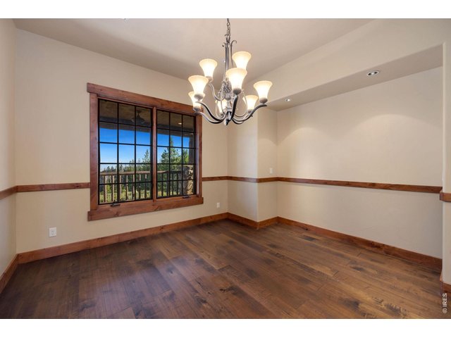 Property Photo 14 Views from the formal dining area look across the peaks and over the valley to the south east