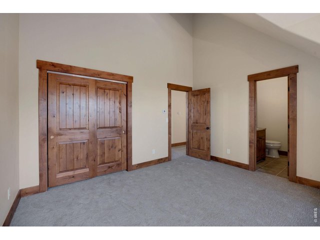 Property Photo 27 Large third bedroom on top floor complete with attached private bathroom
