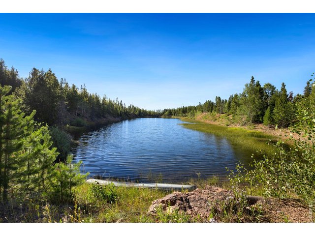 Property Photo 29 View of large lake stocked with brown and rainbow trout