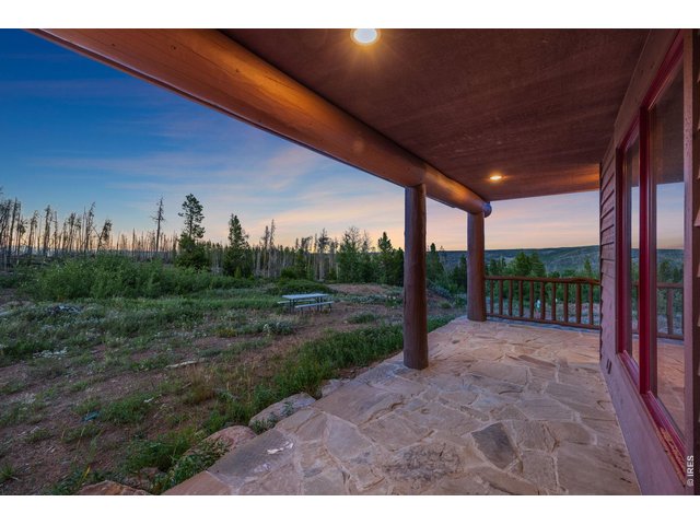 Property Photo 32 View from the back porch to the east looking over at the designated fire pit