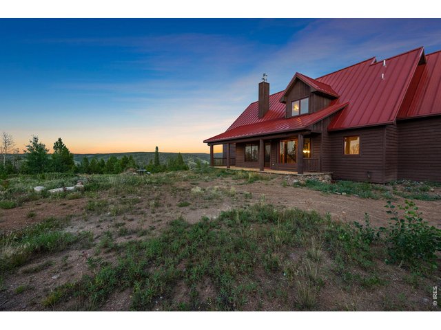 Property Photo 35 Back porch of cabin and fire pit area