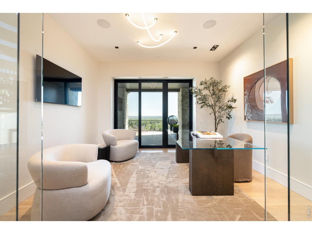 Main level office with views and access to outdoor living space