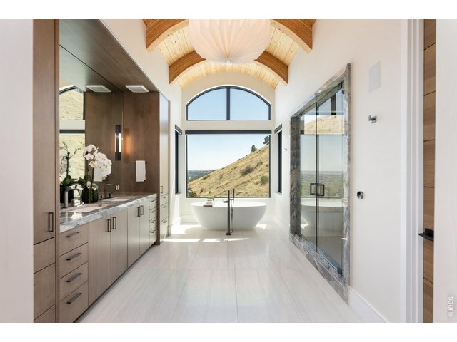 Property Photo 30 No expense spared, spa-like primary bathroom with breathtaking views and sun-filled soaking tub