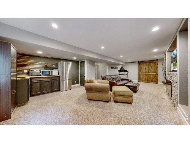Property Photo 22 Bsmt with a Mini Bar