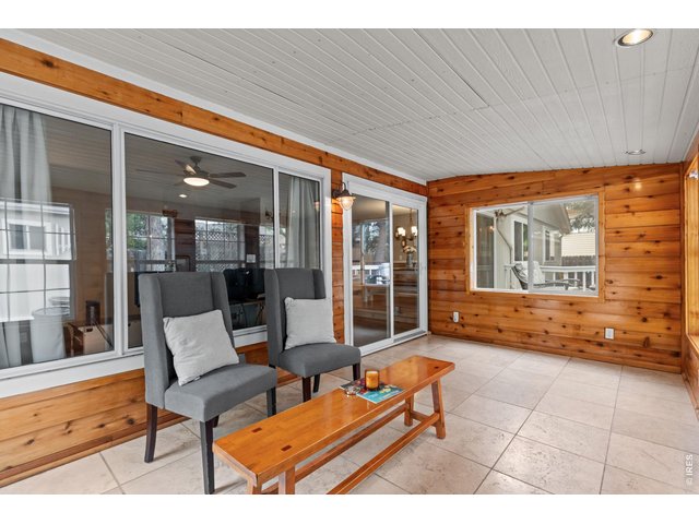 Property Photo 21 Enjoy the sunroom year-round