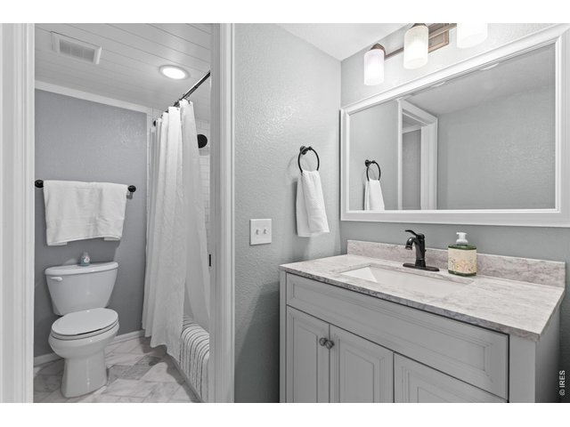 Property Photo 25 Main-level ensuite primary bath