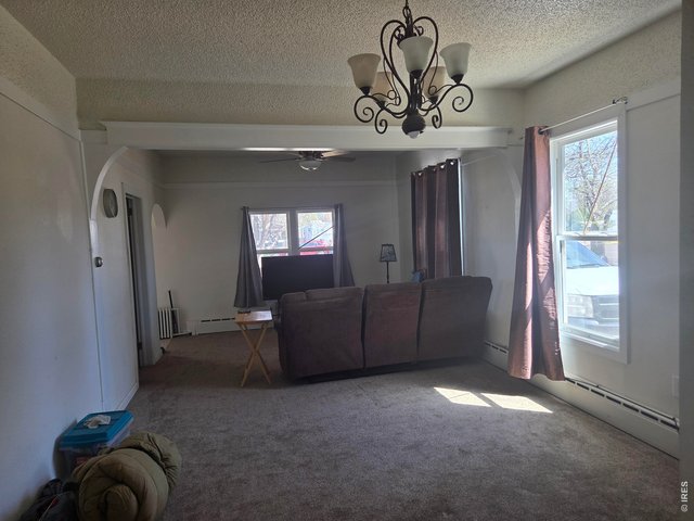 Property Photo 4 Living/Ding area