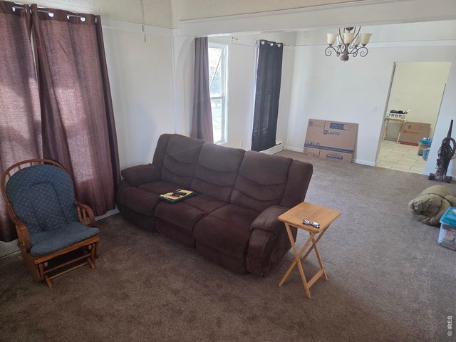 Property Photo 3 Dining / Living Area