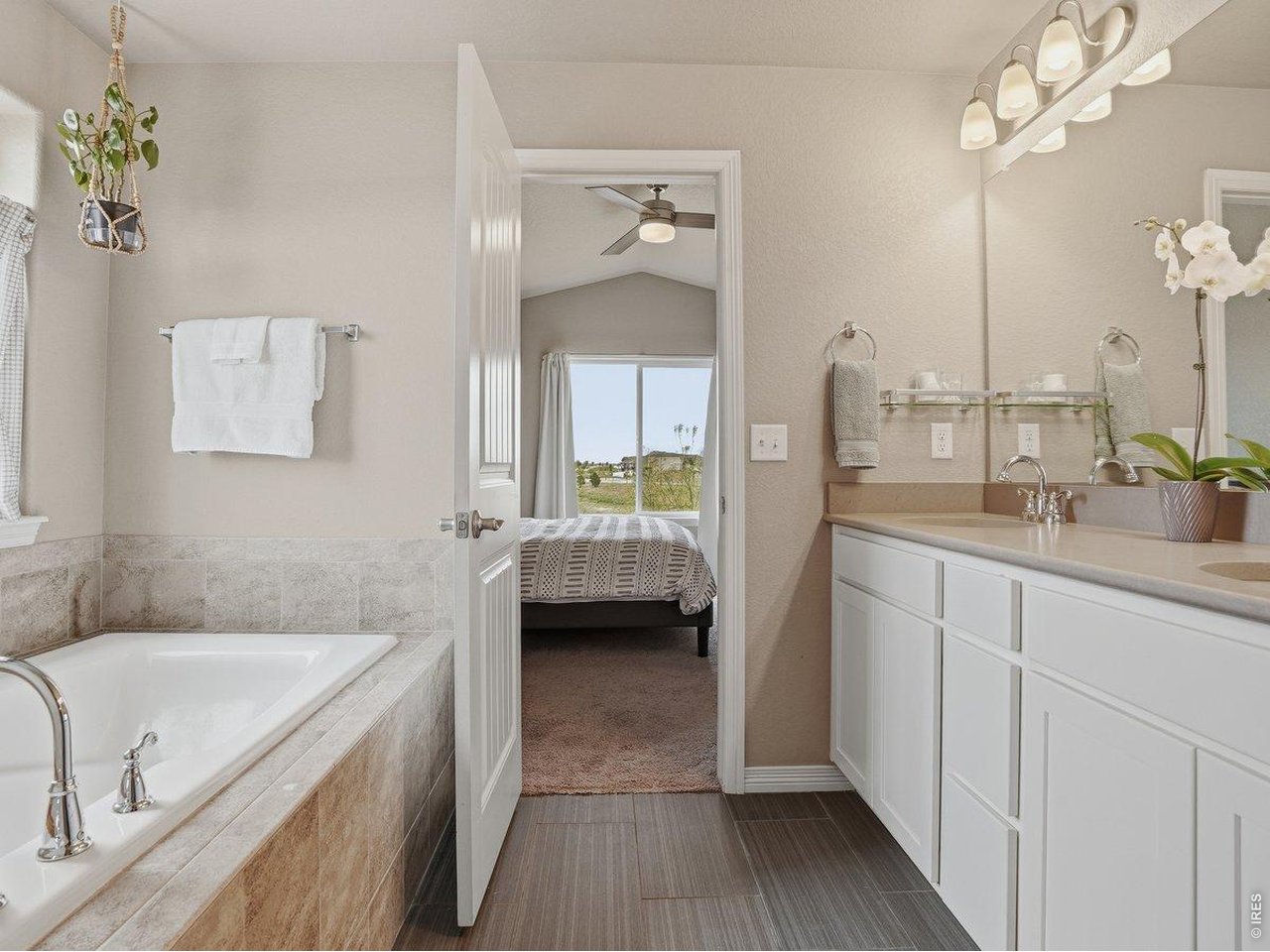 Primary Soaking Tub and Double Sinks