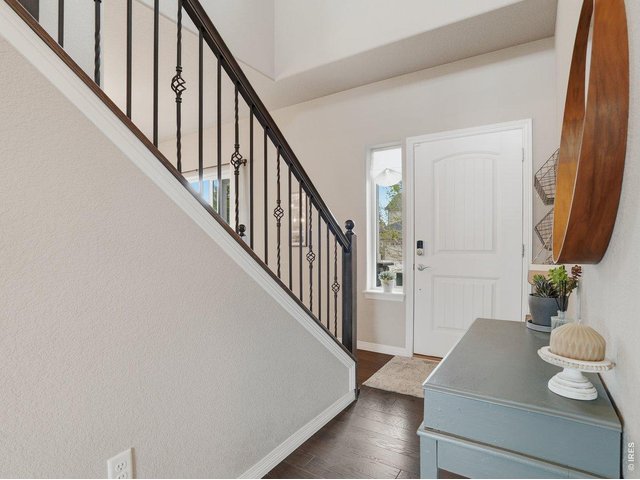 Property Photo 17 Front Entry with Soaring Ceilings