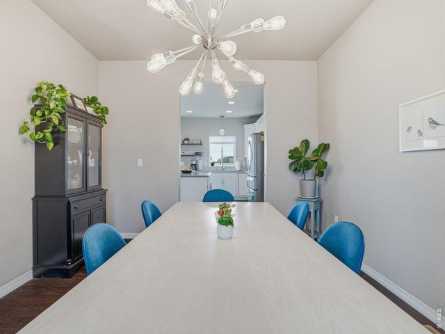 Property Photo 14 Dining Room with Easy Access to Kitchen 
