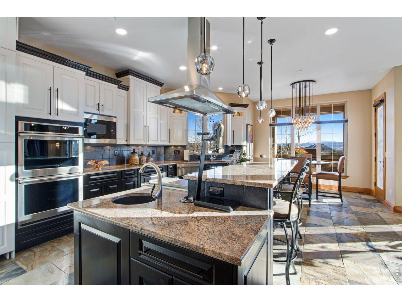 Center two-tier island with breakfast bar