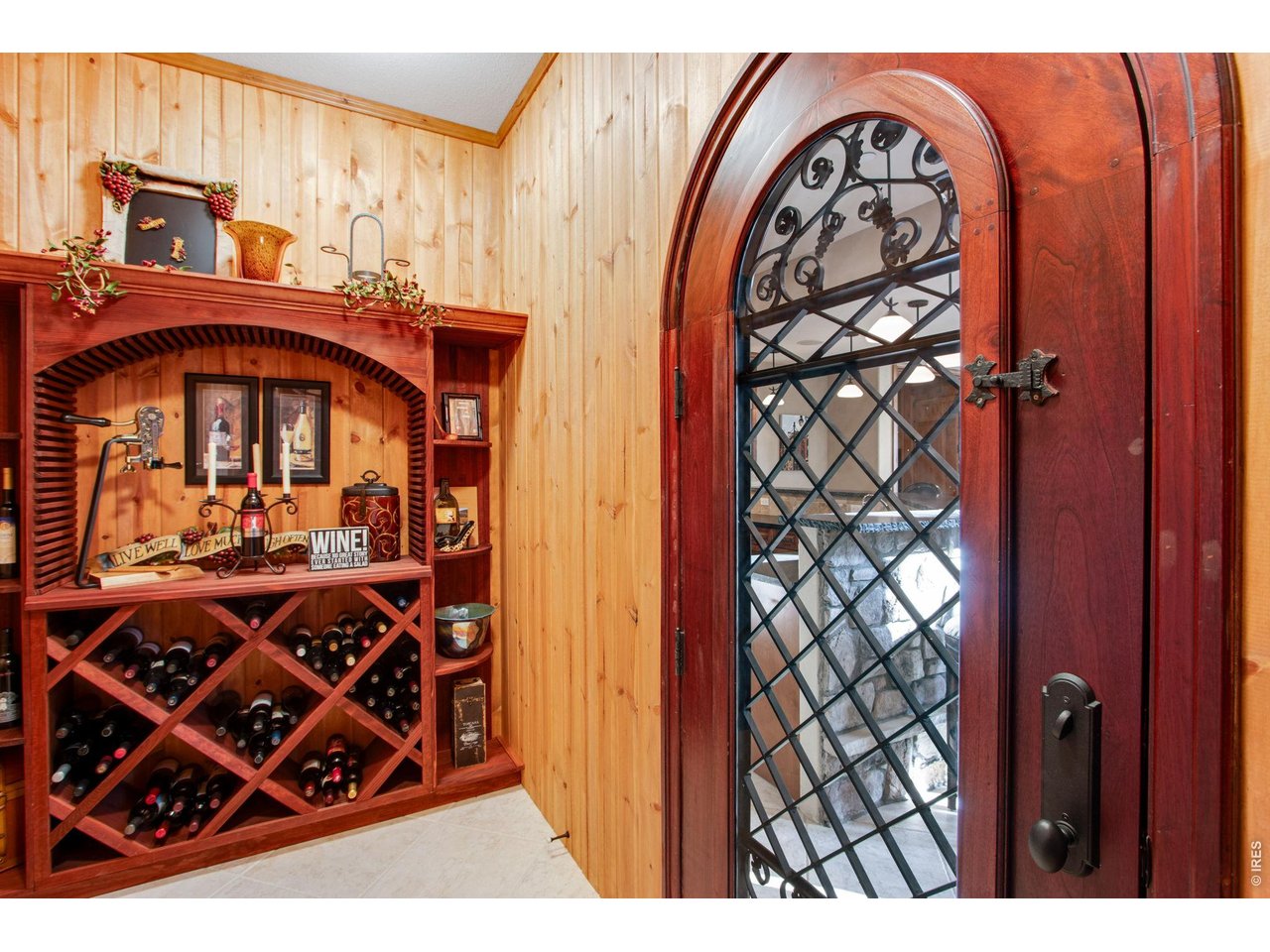 Wine cellar Tucked discreetly in a quiet corner features multiple storage options to keep your favorite vintages close at hand